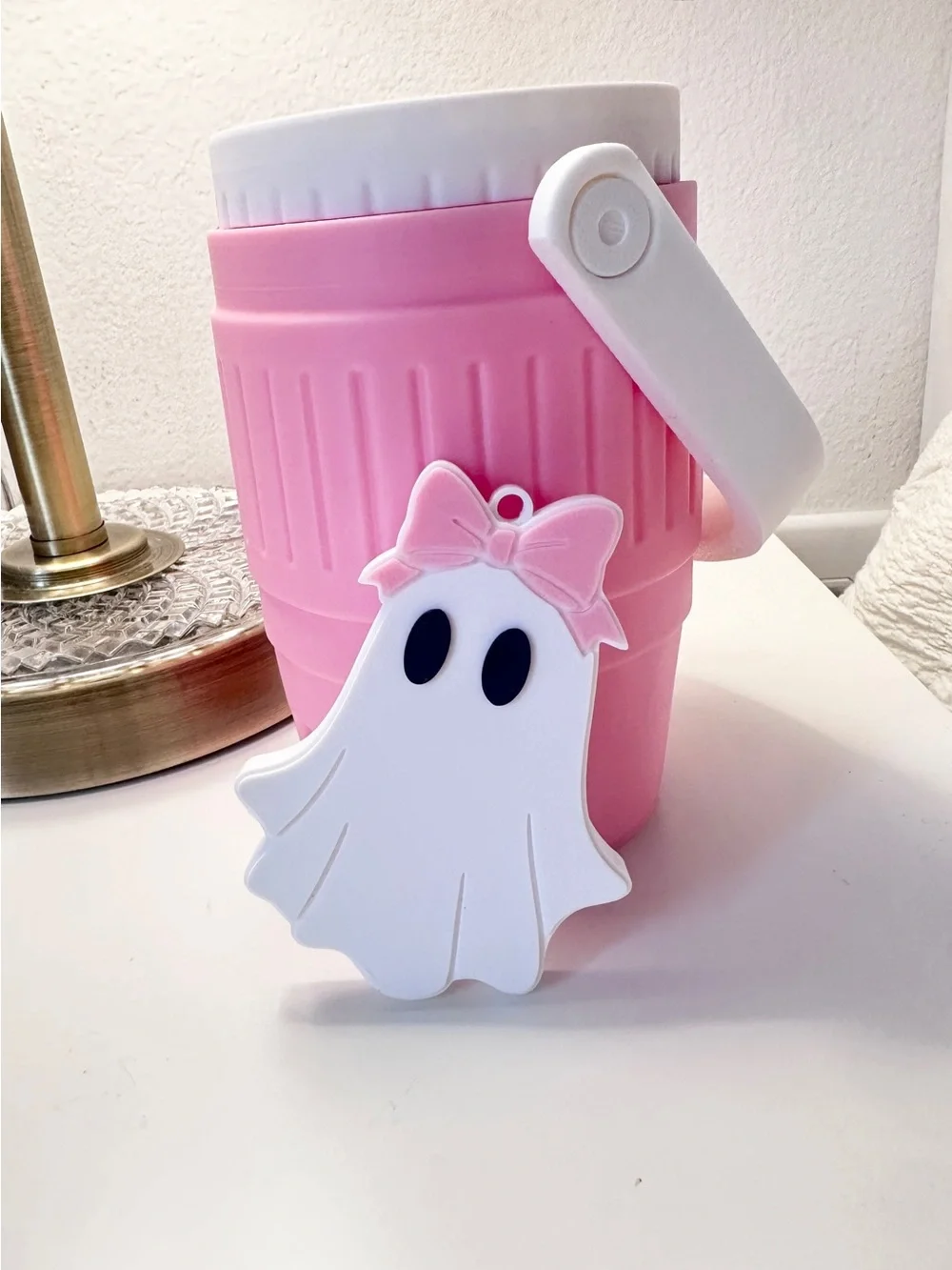 White Ghost with pink bow can opener keychain